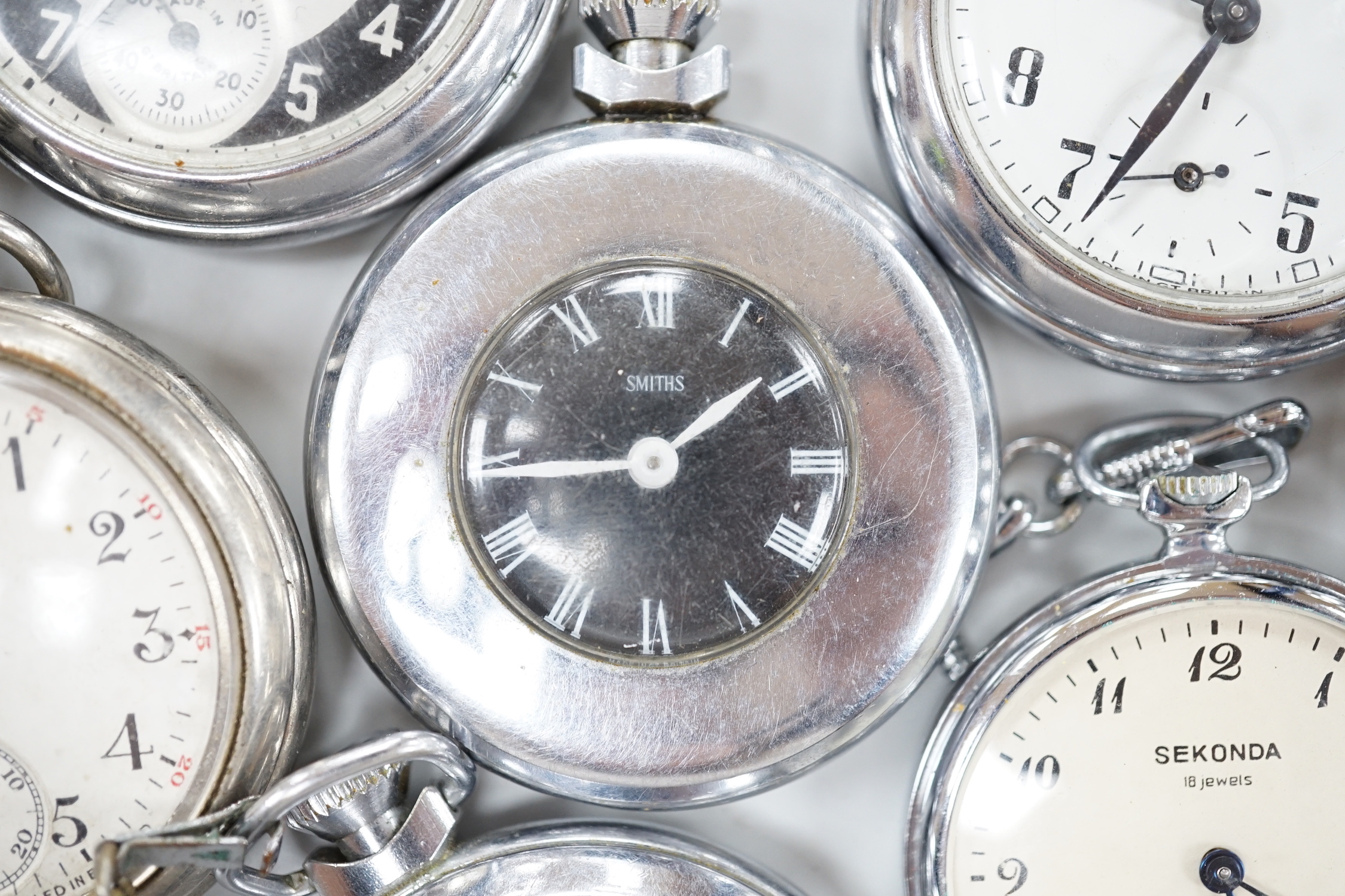 Ten assorted base metal pocket watches including Ingersoll Crown, Sekonda and Smiths.